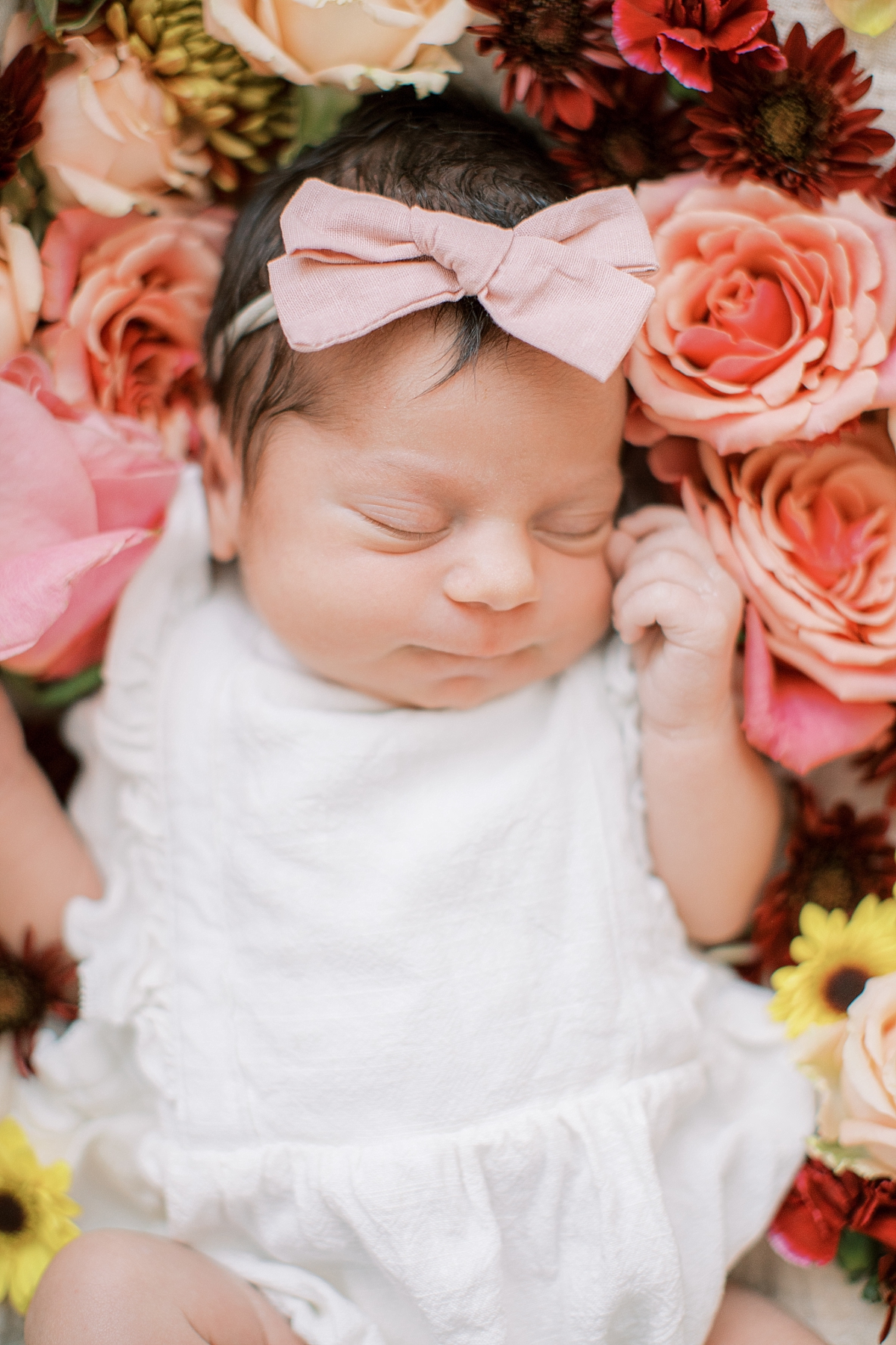 Lancaster, PA newborn photography session in studio with flowers