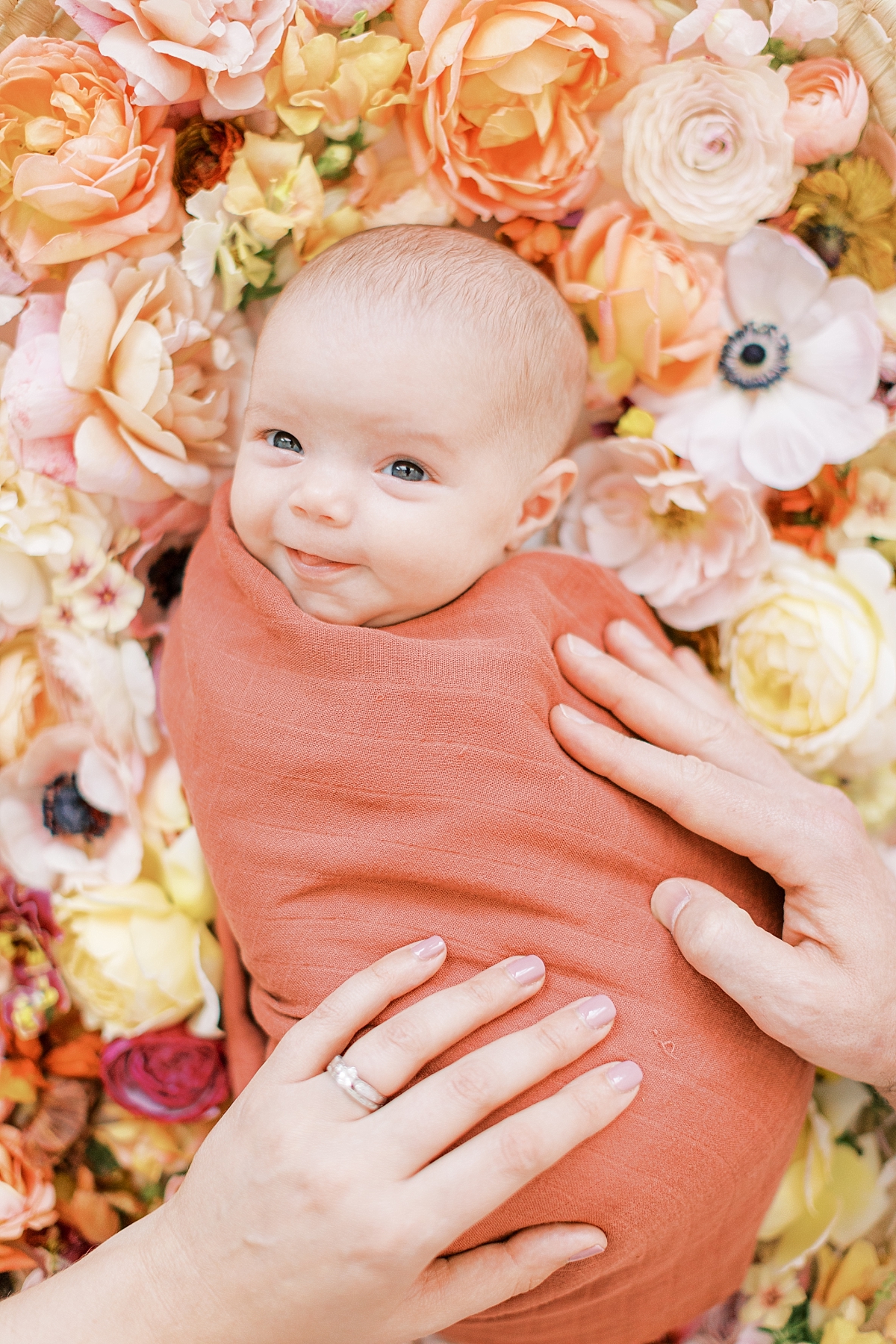newborn girl with floral