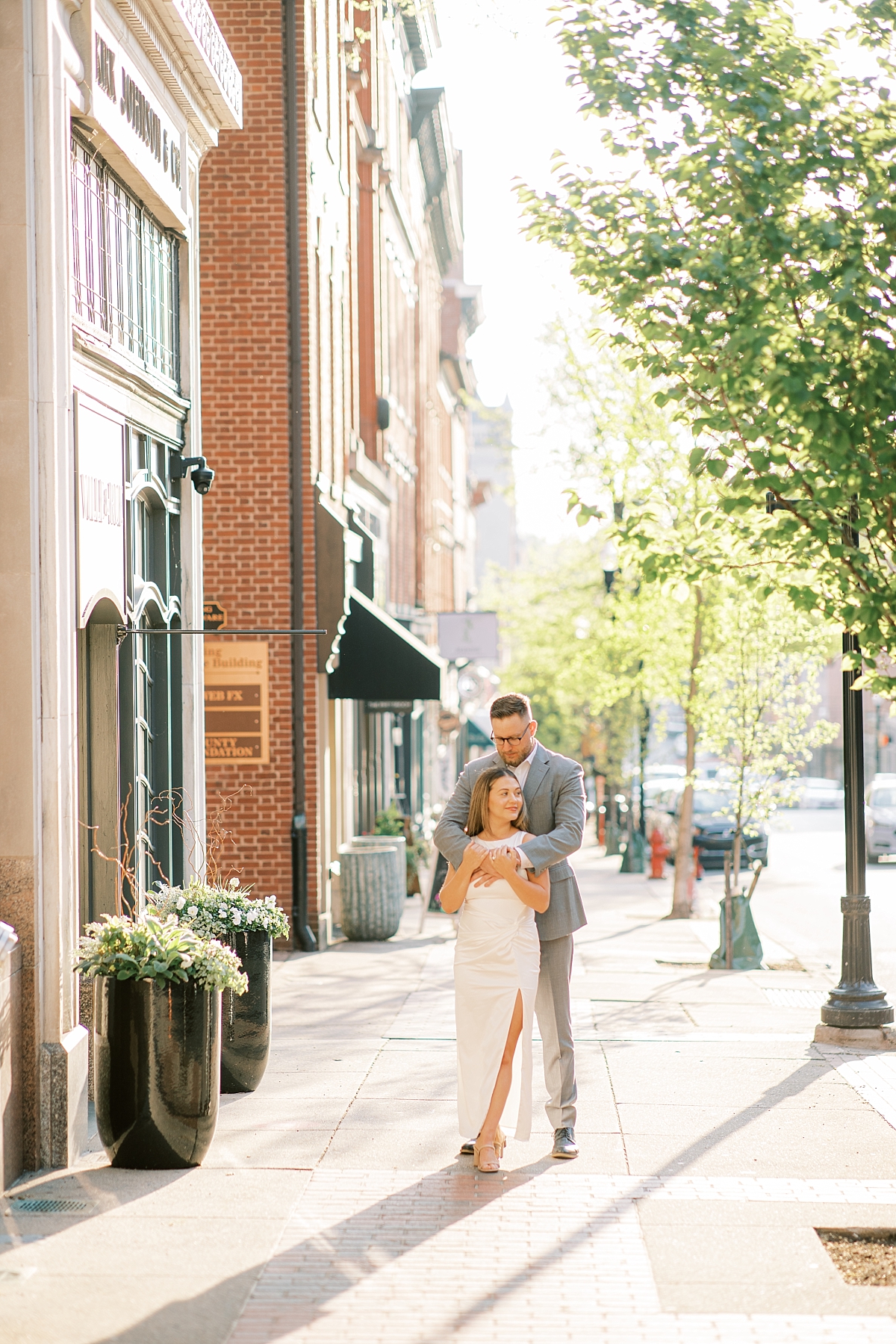engaged couple embracing in lancaster, pa