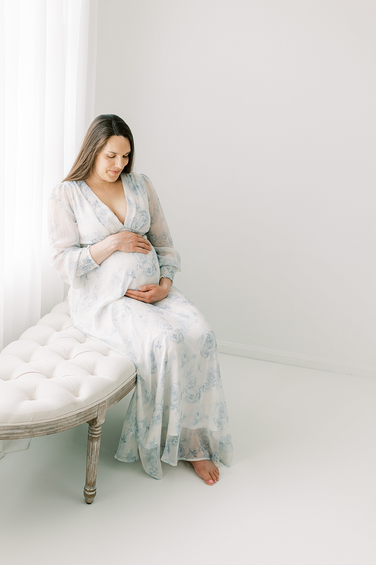 lancaster maternity session in blue sitting on bench