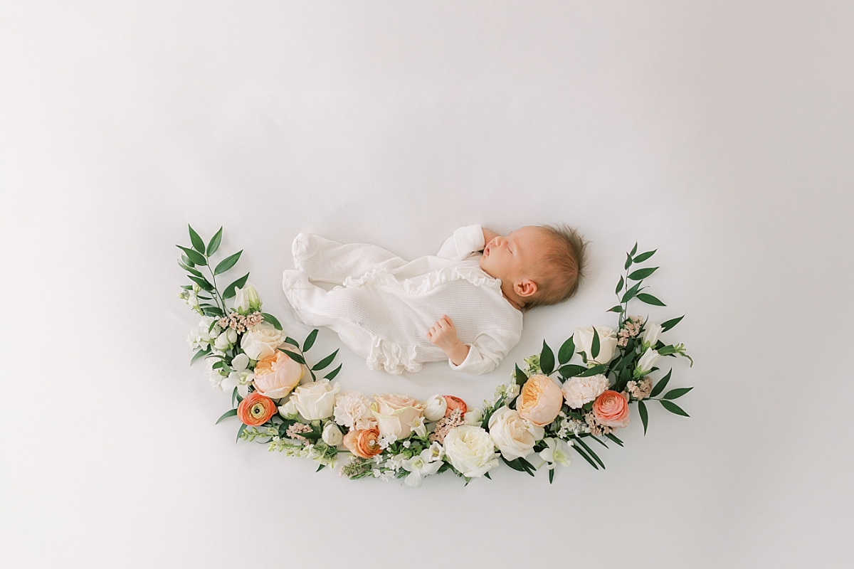 newborn baby girl with florals
