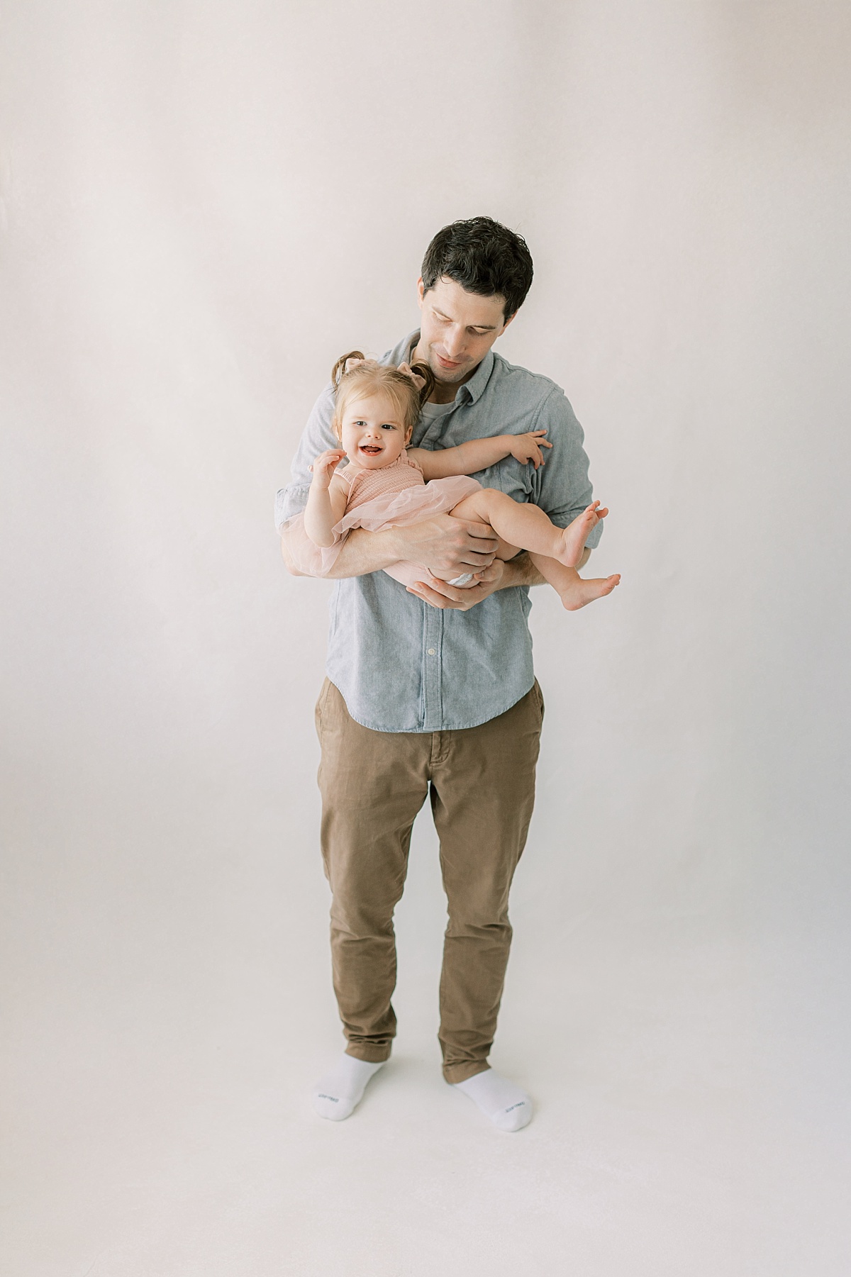 baby girl with her dad